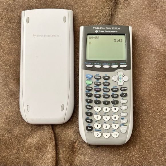 Texas Instruments TI-84 Plus Silver Edition Graphing Calculator - Picture 1 of 7